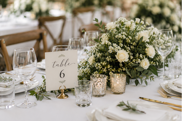 Elegantly decorated wedding reception table with floral centrepieces and table settings in Melbourne