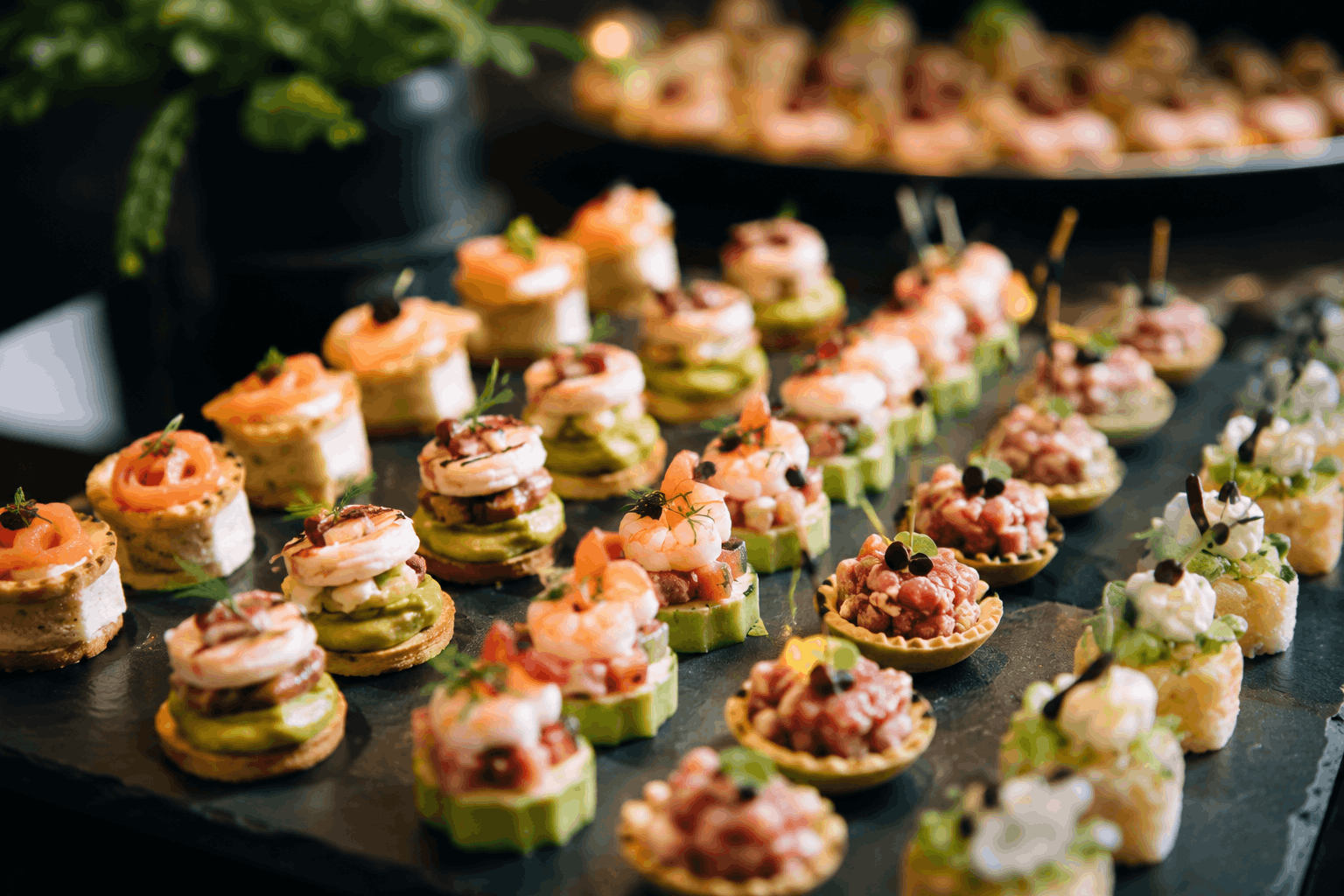 Gourmet Canapés Catering Big Flavours Assorted gourmet canapés with prawns, salmon and vegetables presented on a platter in Melbourne